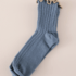 Calcetín canalé azul ribete oro